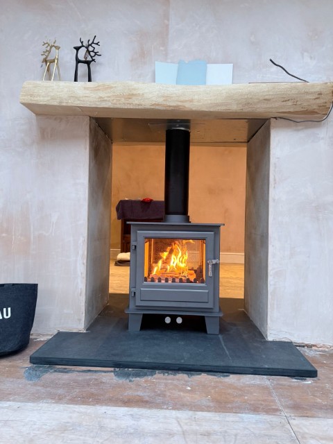 Log burner stove installation